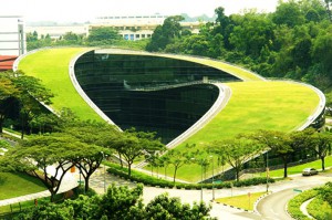 A swirling green roof tops the gorgeous Nanyang Technical University in Singapore